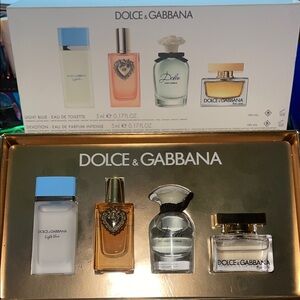 Dolce & Gabbana Perfume Collection with Blue, Orange, and Gold Accents